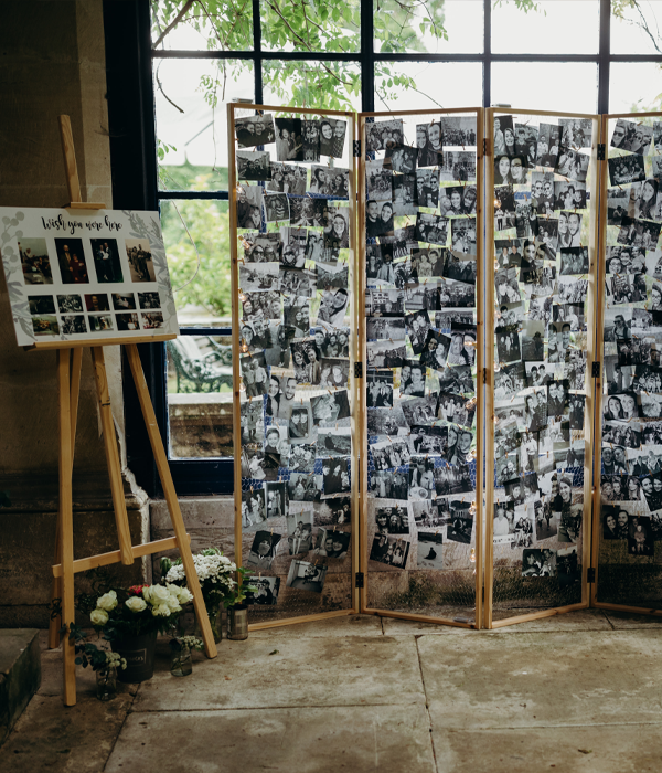 Photographs pinned to a board 